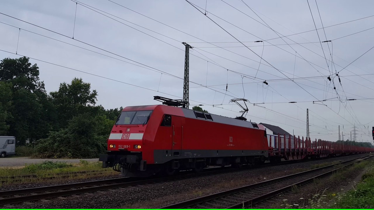 DBC loc 152 069 met platte wagens met staalprofielen door Lintorf (26-07-2016)