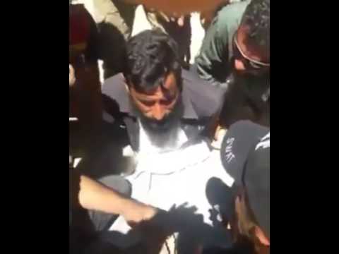 أبطال الحشد الشعبي يقبضون على خنزير داعشي صاحب نهيق يا عاصب الرأس وينك