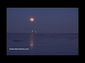 Supermoon Rises over Lake Superior and Icy Ships on New Year&#39;s Day