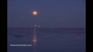 Supermoon Rises over Lake Superior and Icy Ships on New Year&#39;s Day