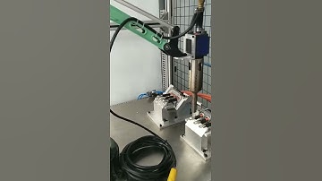 Robot arm automotive wiring harness assembly