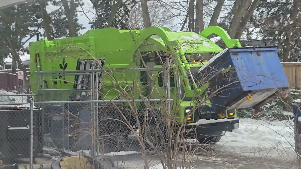 GFL Environmental recycling pickup in the snow