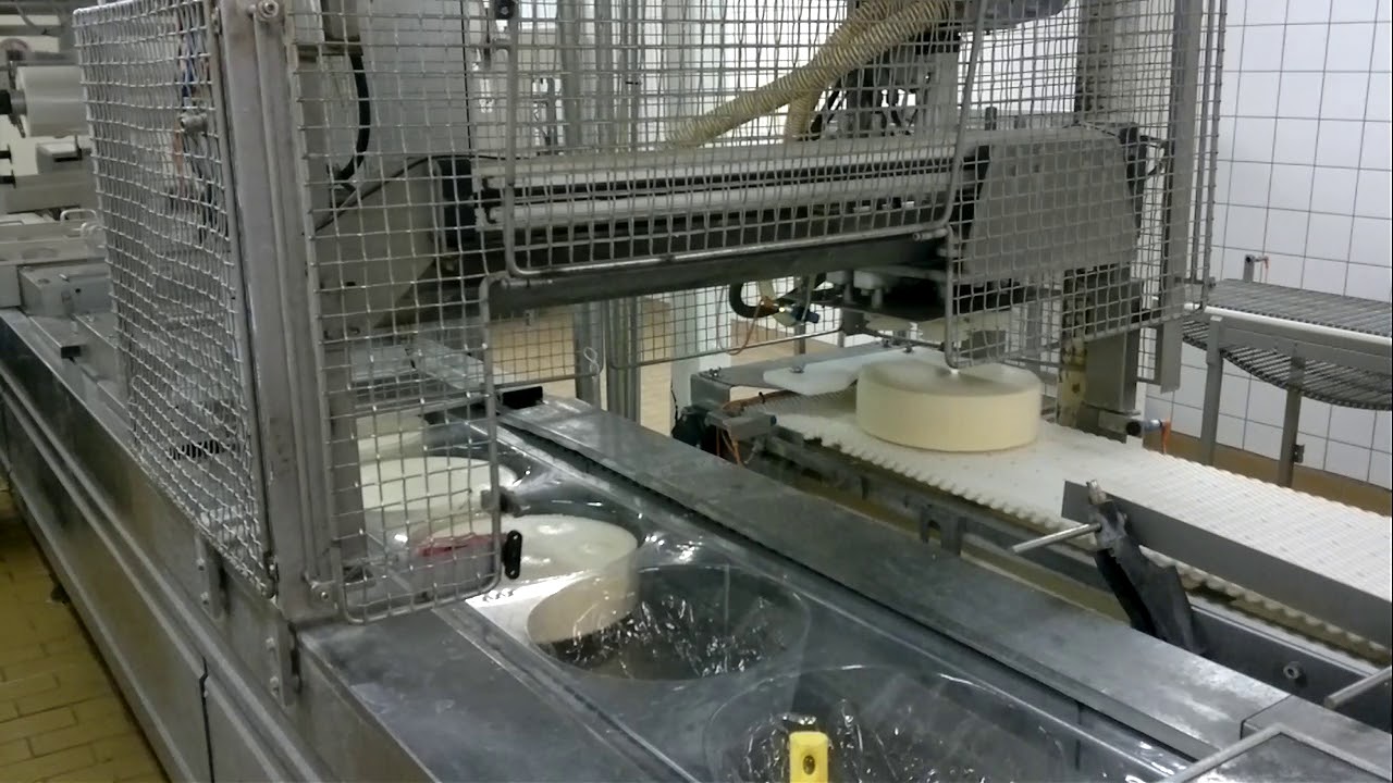 Robot-overføring til pakkemaskine