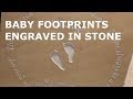 MAKE MONEY FROM SAND BLASTING. Baby footprints engraved in stone with sand carved lettering.