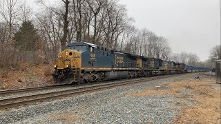 L002 heading west on 4/11/24. Blue RGSU trash containers up front.