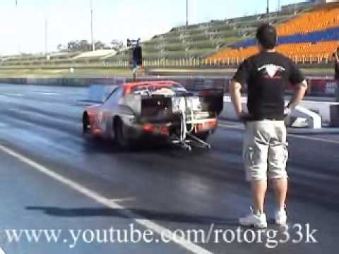 20B Triple Rotor RX7 with a MASSIVE Turbo that Runs a Low 7ET almost a 6 Second Pass