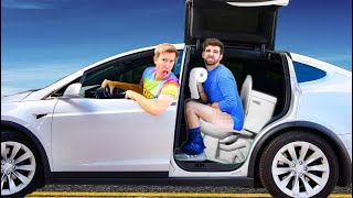 HOMELESS \& LIVING in a TESLA for 24 HOURS!