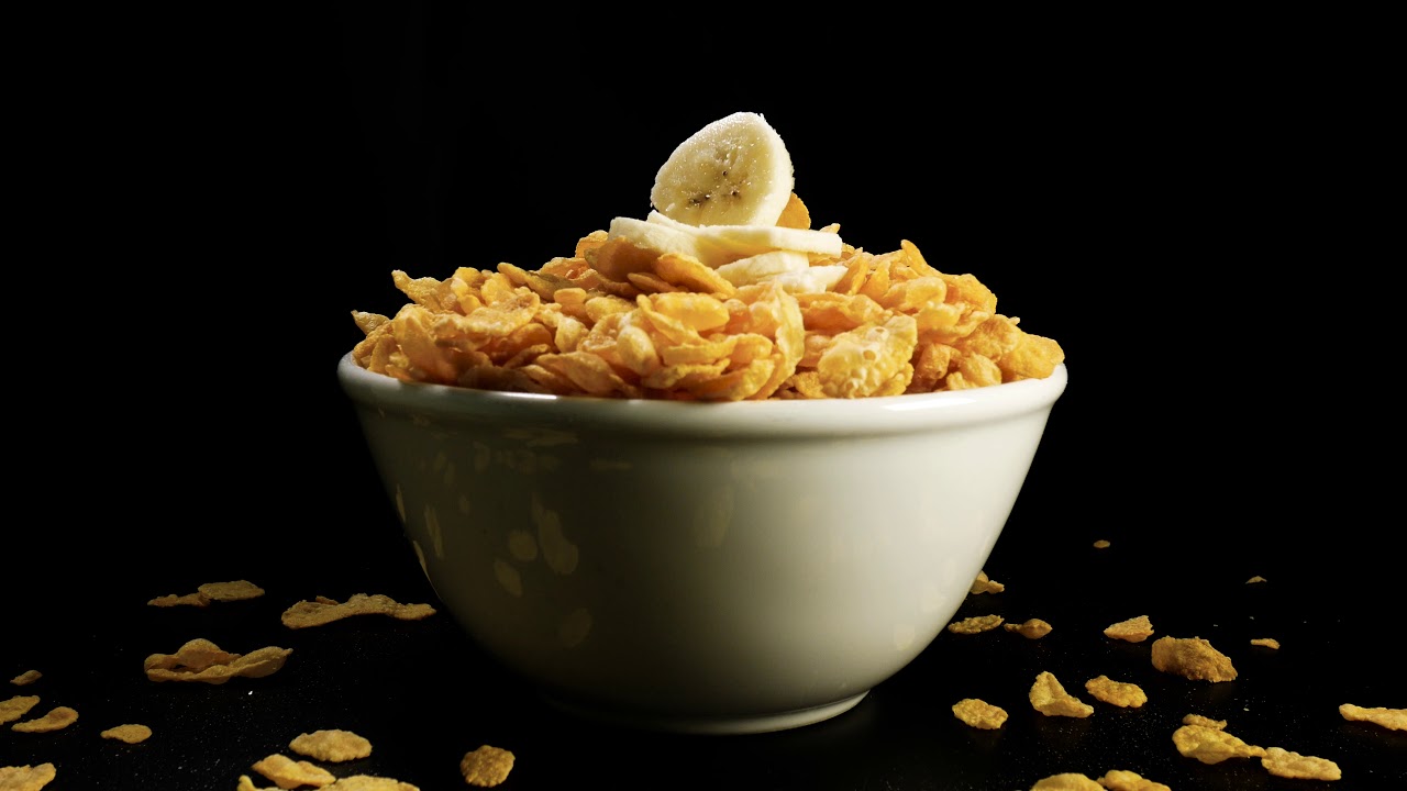 A bowl of cereal banana and milk YouTube