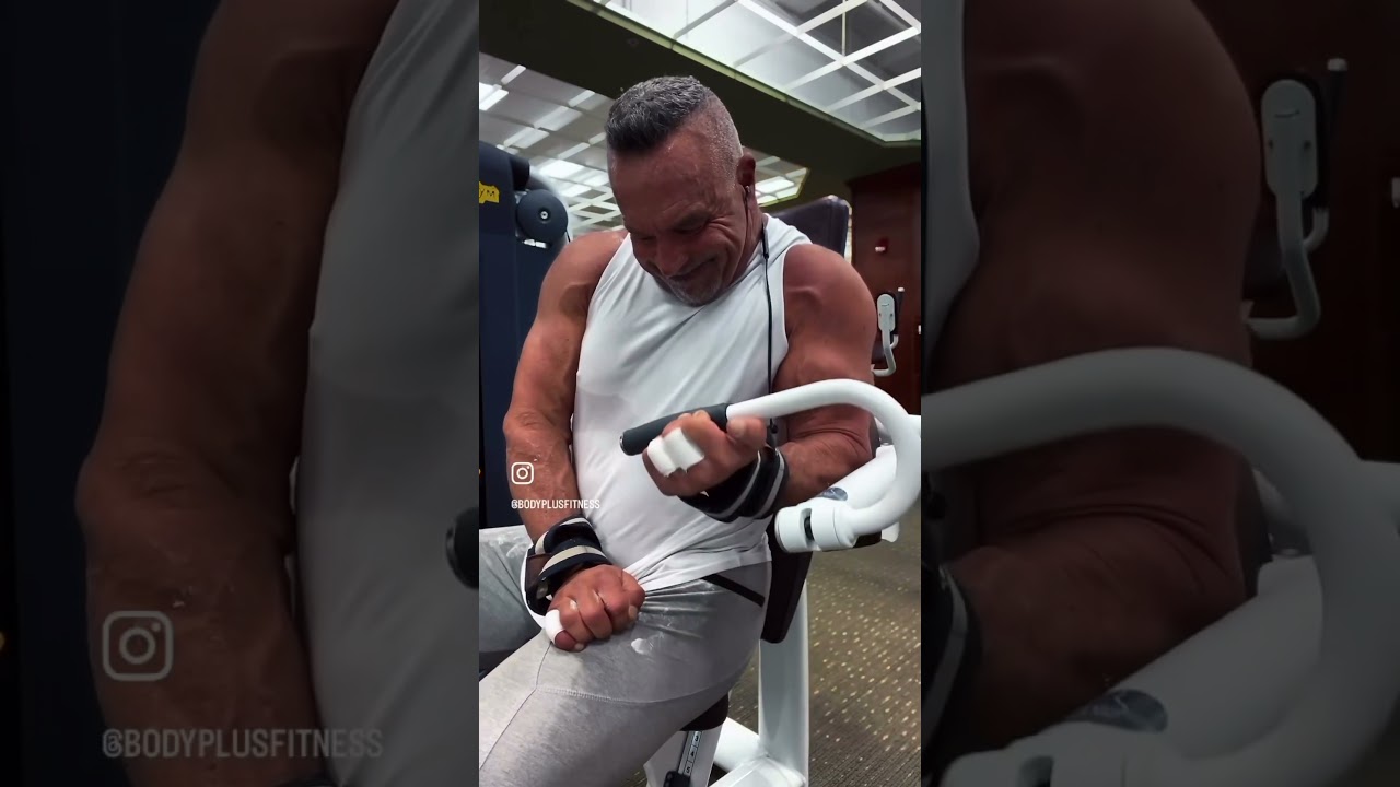 A thumbless grip leading with the wrist is the most effective way to isolate the bicep for peak