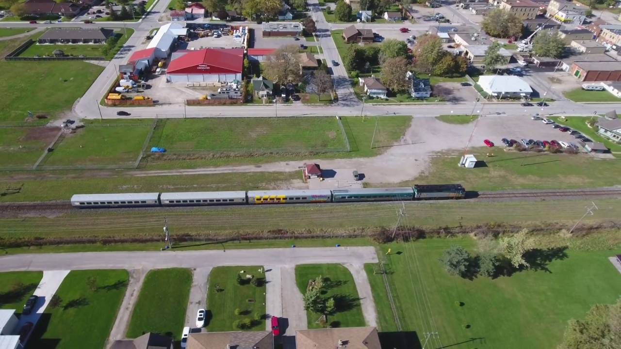 VIA Rail passenger train #73 & #76 meet, Glencoe ON [drone,4k] (2017-Oct-18)