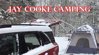Out tent camping at a snowy Jay Cooke State Park in spring.