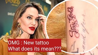 ANGELINA JOLIE REVEALS NEW TATTOO during Outsider opening