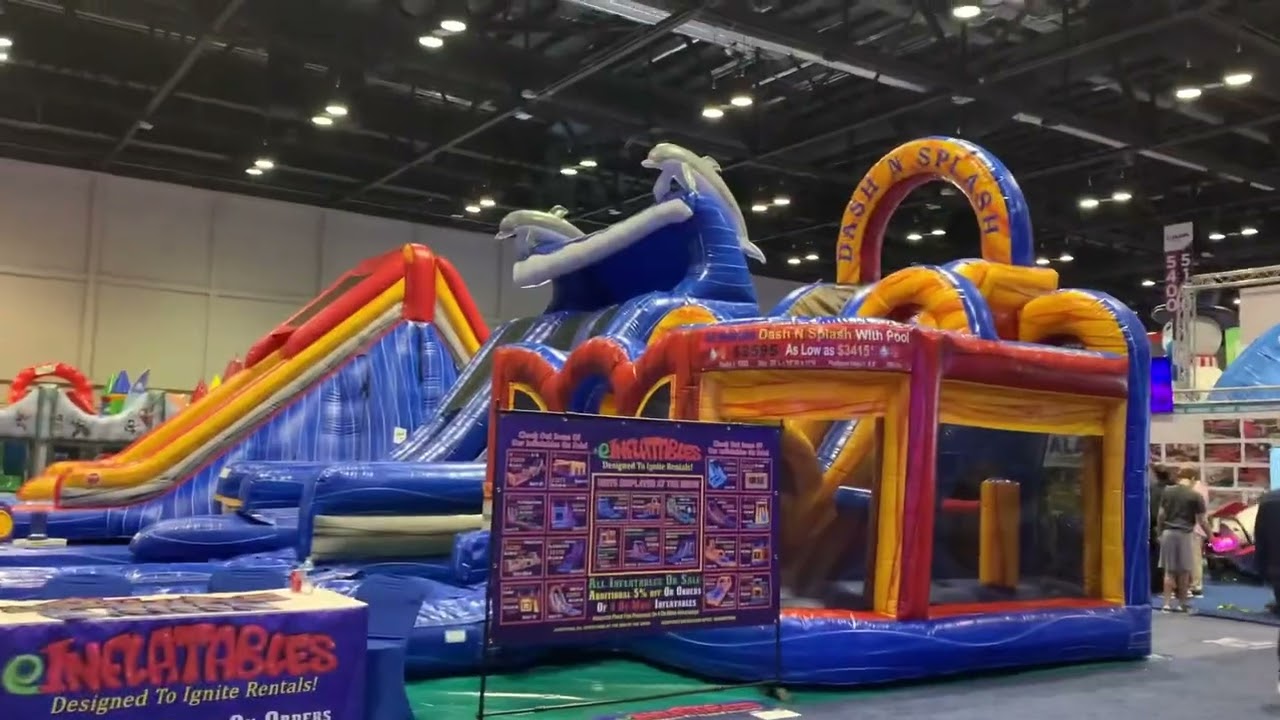 2022 IAAPA Trade Show Orlando Florida. Carnival rides, Bounce houses.