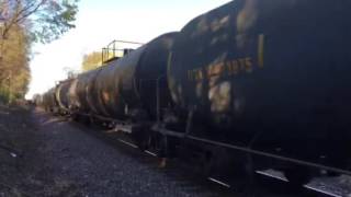 2 NS engines 1 CP engine pulling Steel Cars and Tank Cars