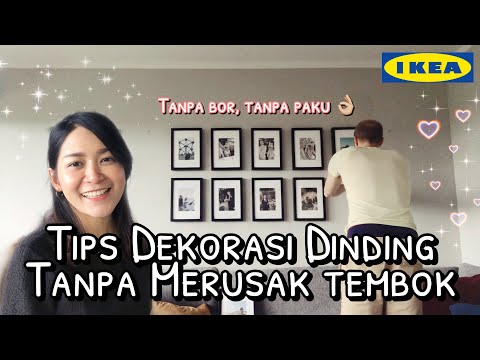 Video: Di mana menempatkan gantungan kawat pada bingkai foto?