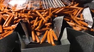 PrimoCombi multihead weigher accurately weigh dispensing long sausage sticks and jerky