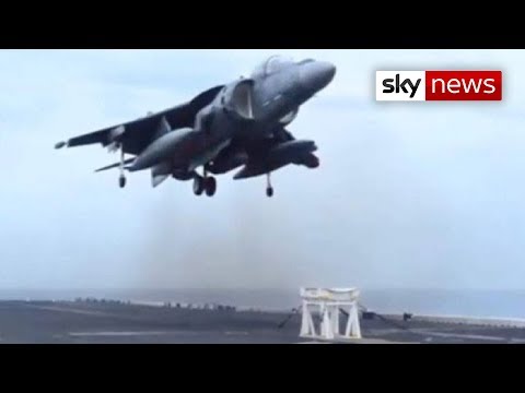 US Navy Harrier Jet Lands On Stool