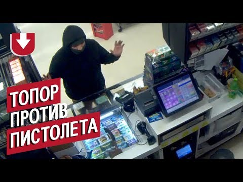 Видео: Мужчина грабит магазин EB под прицелом