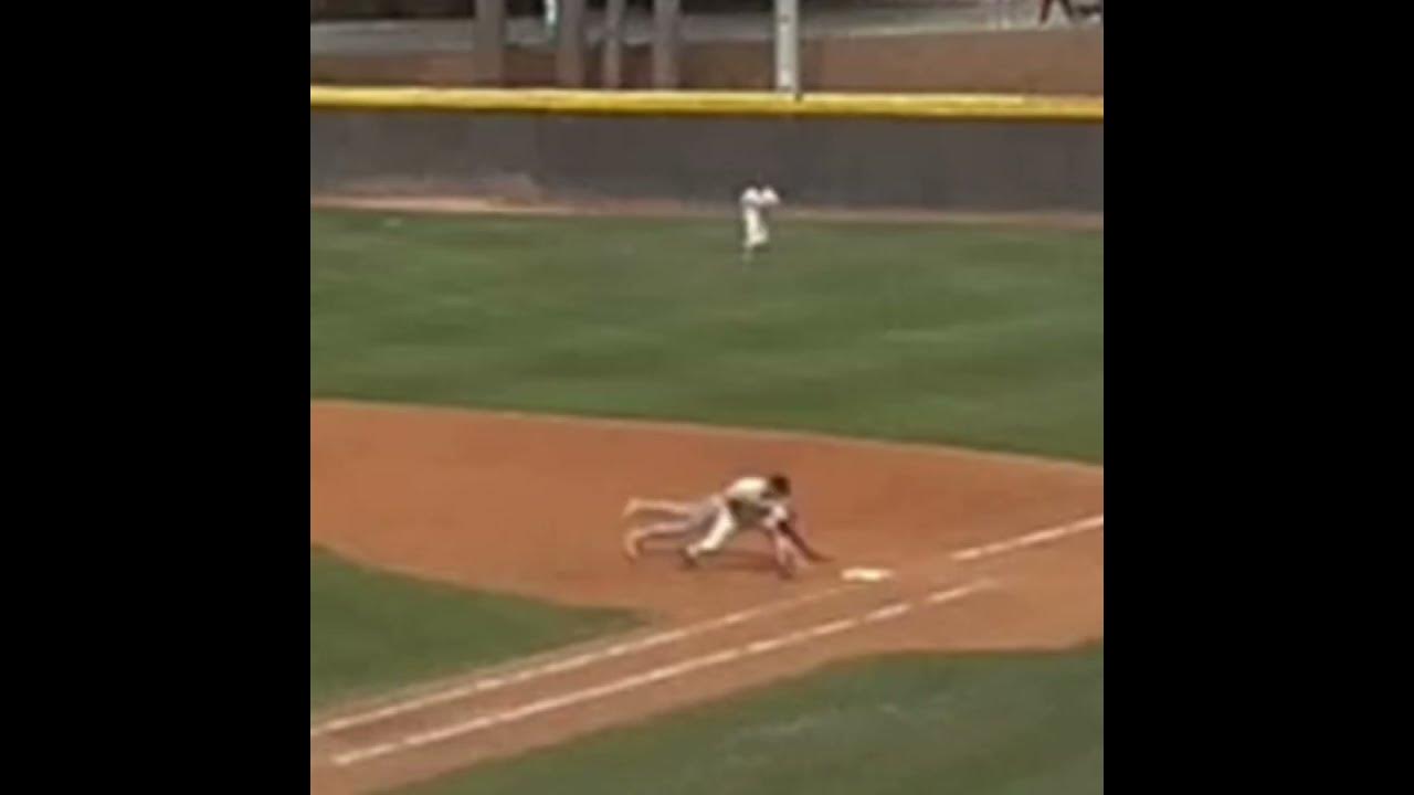 Holding 1b runner with right hand first baseman YouTube