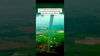 Pilot Flies Next To Land Spout