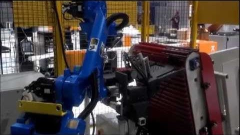 Motoman robot tending a CNC tube bender