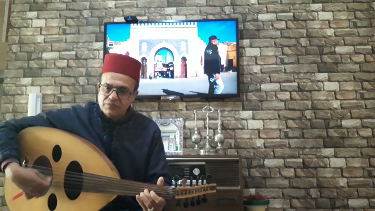 موسيقى أندلسية مغربية. بغية ثم صنعة من قدام رمل الماية. أداء عمر الغياتي.