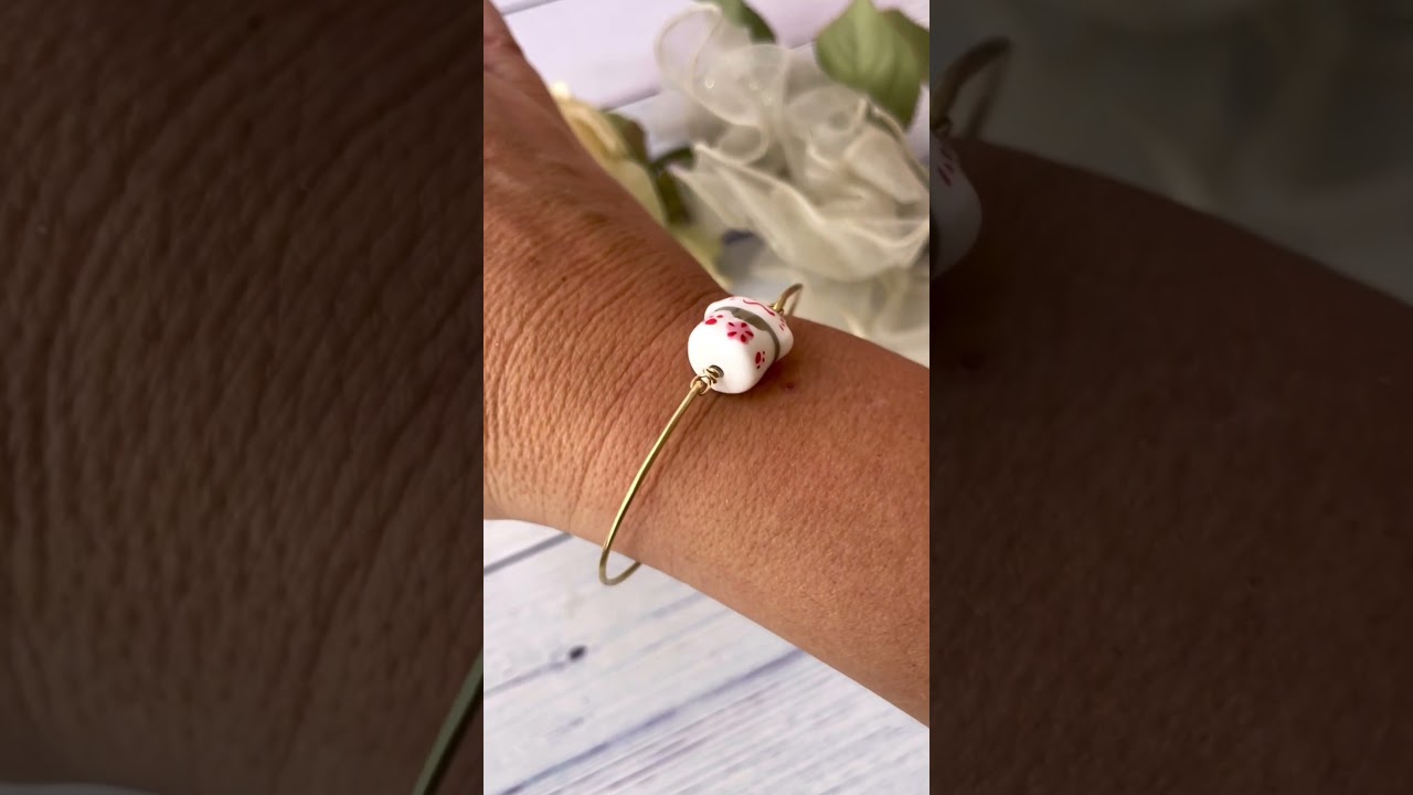 Showing off my new lucky cat bracelet 