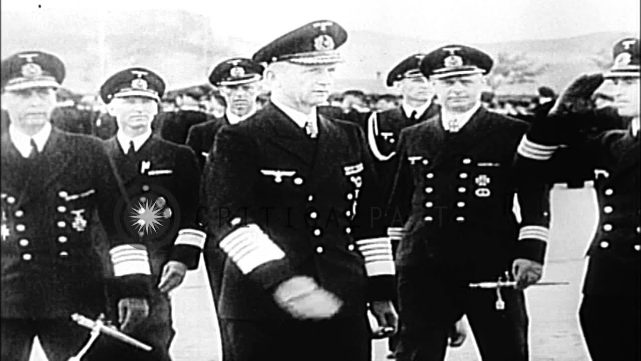 Admiral Karl Doenitz reviews German sailors and addresses them in