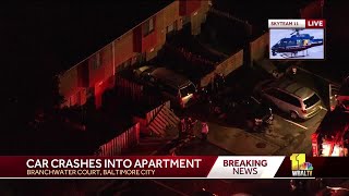Car crashes into apartment in Baltimore City