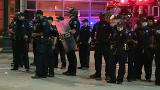 Group of protesters confront Detroit police