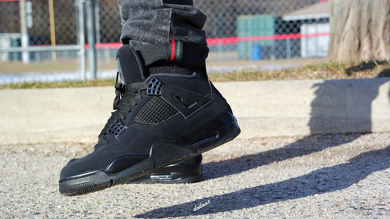 jordan 4 black cat on feet