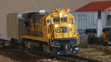 Rapido B36-7 pulling a short local around the layout