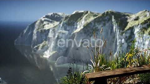 Fresh Grass at Big Rocky Cliff in Ocean | Motion Graphics - Envato elements