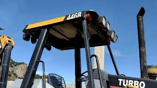 reparando retroexcavadora caterpillar 446b
