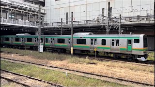 【E231系U12編成5両  OM出場前構内試運転に伴う送り込み試運転（車体保全）】E231系1000番台ﾔﾏU12編成が試運転幕でOM構内を警笛を鳴らし発車するシーン（試9999）2023.11.6