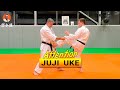 Juji uke  blocage en croix  karate