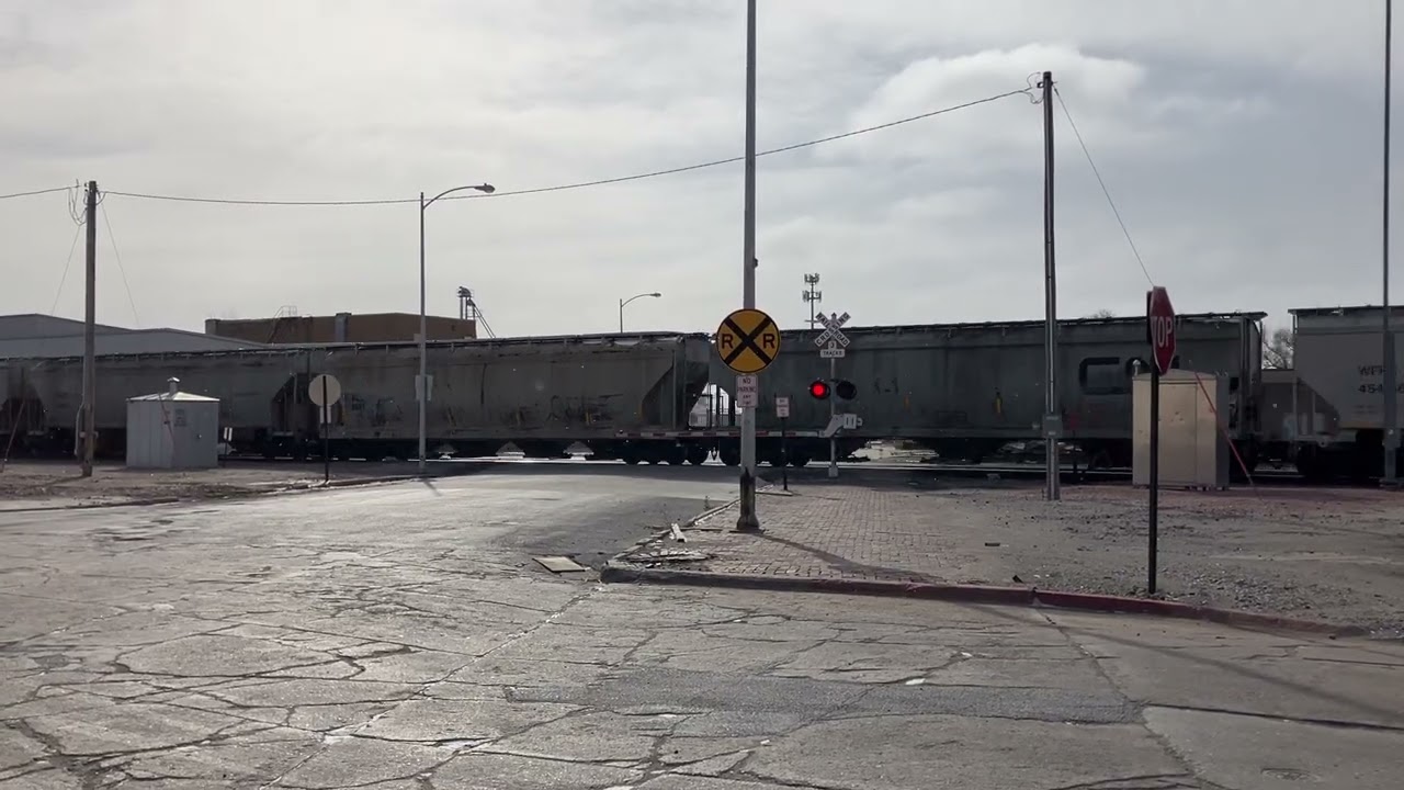BNSF 6200 Grain Train w/ KCS and CP Rear DPU East, Main St. Railroad Crossing, Fremont NE