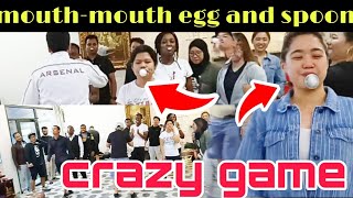 Mouth to mouth egg and spoon survival game - christmas party bahrain