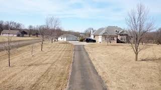 12044 NE 66th Street Bondurant, IA 50035 Driveway to Home View