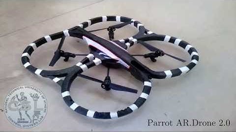 Quadrotor Landing on an Inclined Platform of a Moving Ground Vehicle