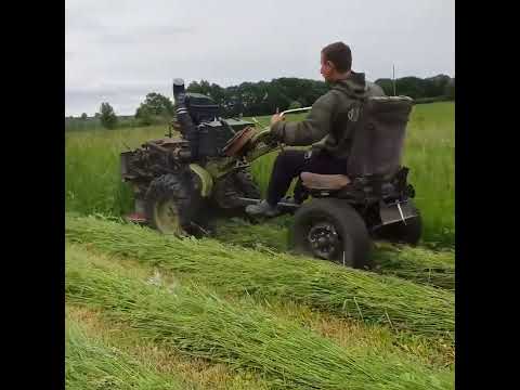 Video: Rotary mower for walk-behind tractor and its device. Homemade rotary mower for walk-behind tractor