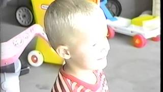 Nathan watching rainstorm "flying up in the sky"- Tooele 1999
