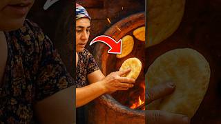 An Uzbek woman is baking a bichak #village #food #lifeisbutadream #relaxing  in a tandoor
