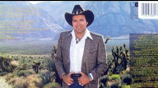 Watch Mickey Gilley Shes Still Got A Hold On You video