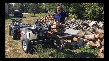 Splitting Oak with the Wolfe Ridge 35 ton S.H.O. log splitter with 8 way wedge!!