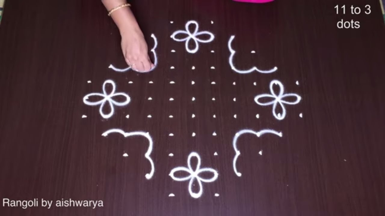11 to 3 Flower Rangoli Designs