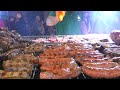 Italy Street Food Festival. Juicy Ribs, Angus, Pork Knuckles, Metres  Long Sausages, Paella