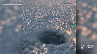 Giant holes on some Tampa Bay area beaches causing concerns over danger for people, sea turtles