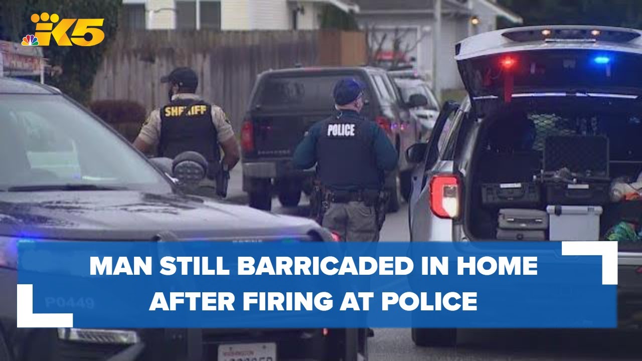 Man remains barricaded inside home after allegedly firing at police ...