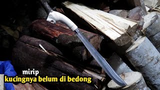 pengerajin gagang golok ini,, membuat ukiran gagang golok kepala kucing....